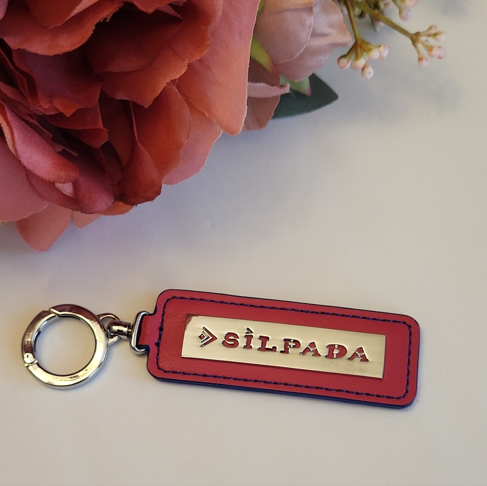 Silpada Leather Keychain Silvertone Metal Brand Logo Dark Pink Hue